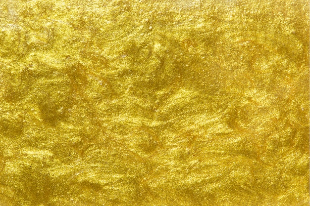 Gold painted textured wall background