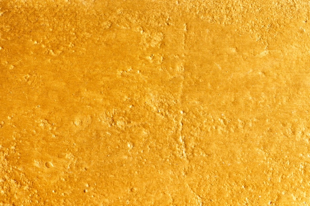 Free photo gold textured background