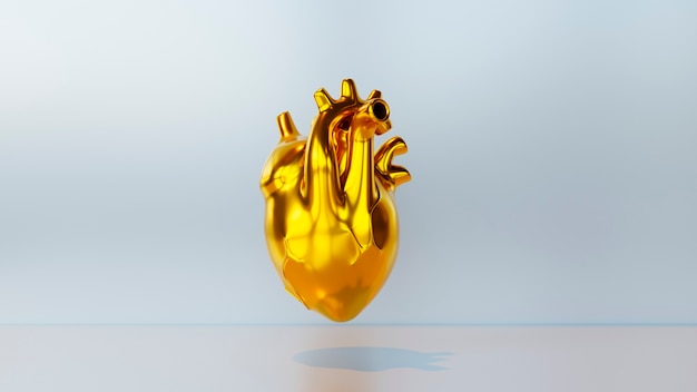 Free photo golden anatomical heart with blue background