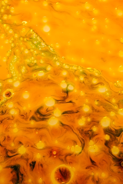 Golden background with lit bubbles