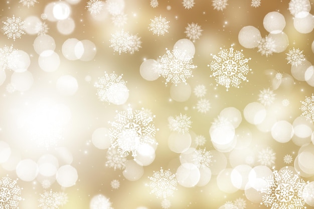 Free Photo | Christmas background with gold bokeh lights and snow