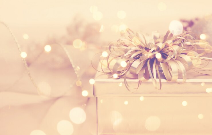 無料Photo ギフトとゴールデンクリスマスの背景