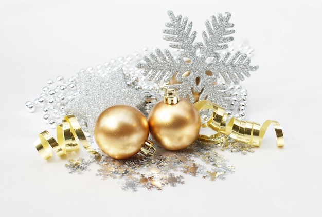 Golden christmas balls and a snowflake