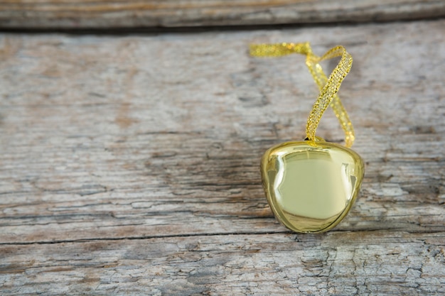 Golden christmas decoration on a wooden table