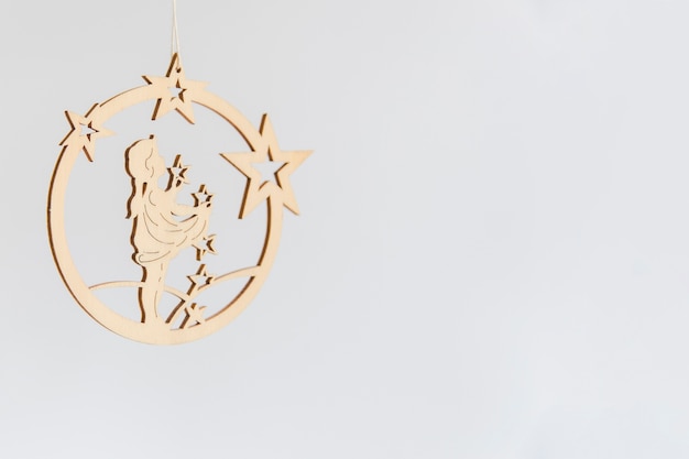 Golden circular christmas hanging ornament on white background