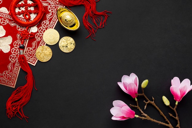 Golden coins and magnolia chinese new year