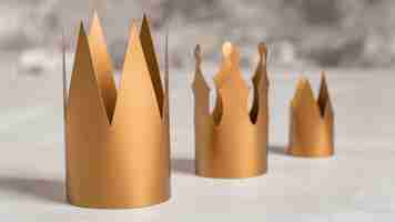 Free photo golden crowns blurred background