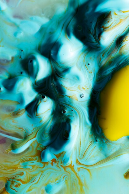 Golden egg yolk and abstract blue whites