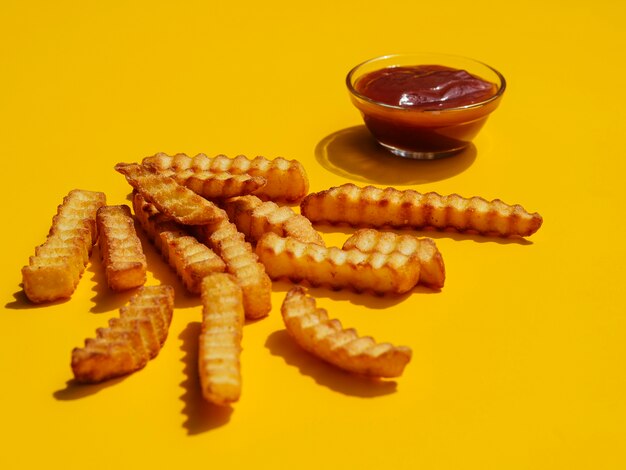 Golden french fries with ketchup