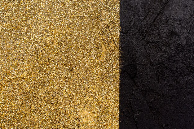 Golden glitter with slate background concept