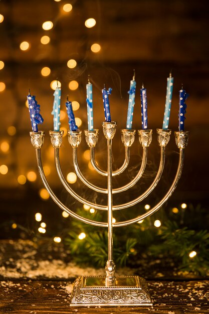golden menorah with candles