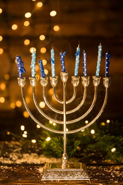 Golden menorah with candles