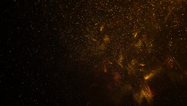 Golden particle dust sparkling glitter background