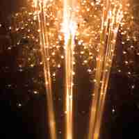 Free photo golden particles lights wallpaper