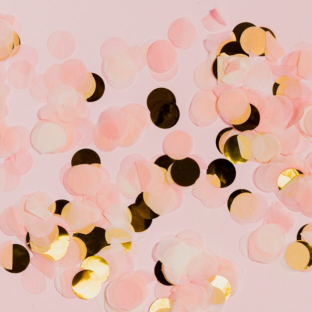 Golden and pink confetti at new years party