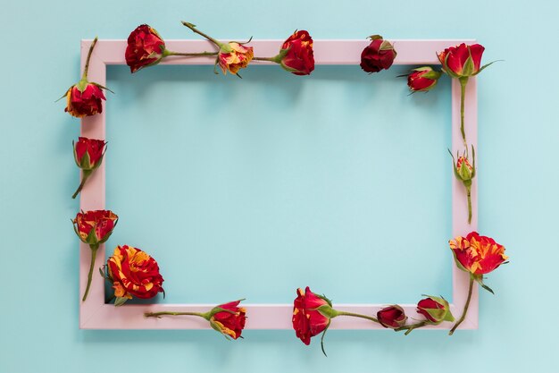 Golden and red flowers with pink frame