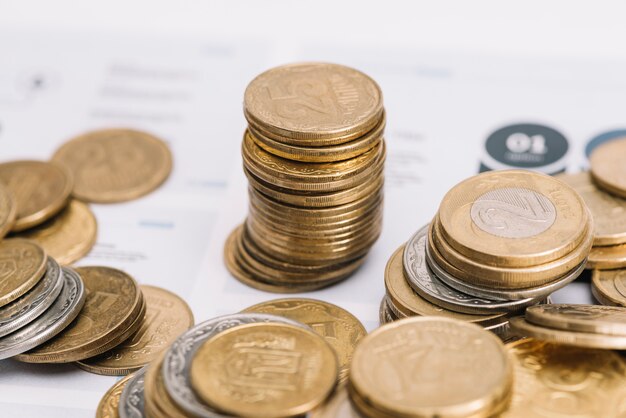 Golden stack of coins over the infographic template