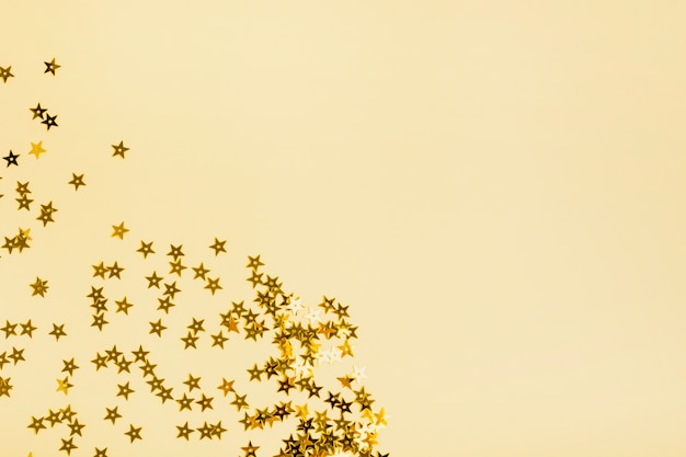 Golden star sequins with copy space