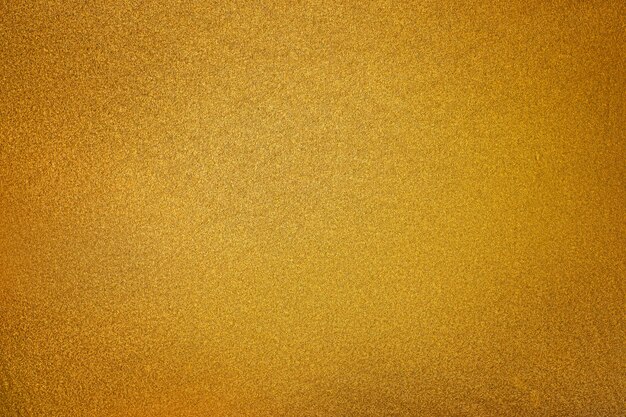 Golden texture with a lightspot background