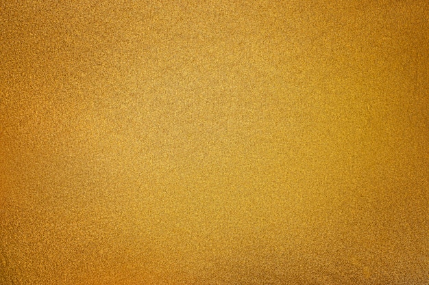 Golden texture with a lightspot background