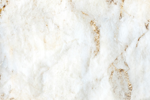 Golden white marble textured background