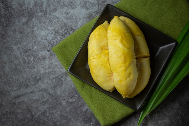 Free photo golden yellow durian flesh seasonal fruit thai fruit concept.