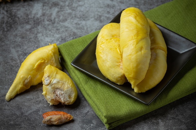 Free photo golden yellow durian flesh seasonal fruit thai fruit concept.