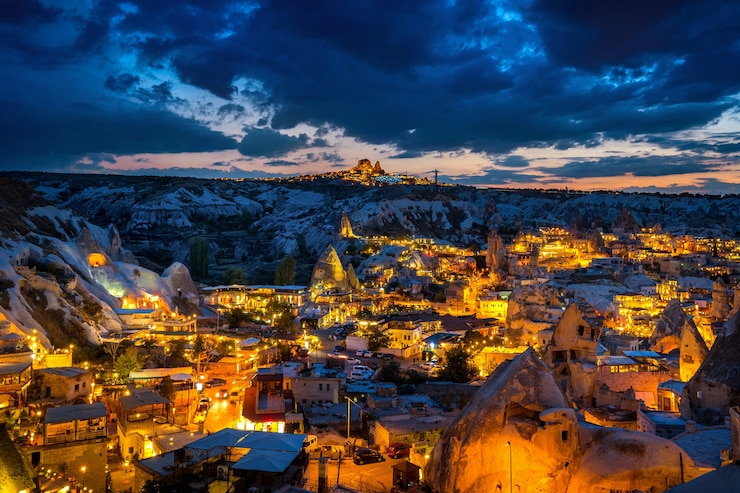 Free Photo goreme town at twilight in cappadocia, turkey.