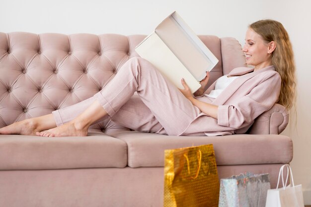 Gorgeous adult woman checking purchases