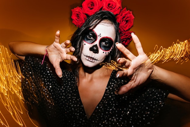 Free Photo | Gorgeous Young Female Model With White Face Painting Posing In  Halloween Studio Photo Of Debonair Zombie Girl Standing On Sparkle  Background