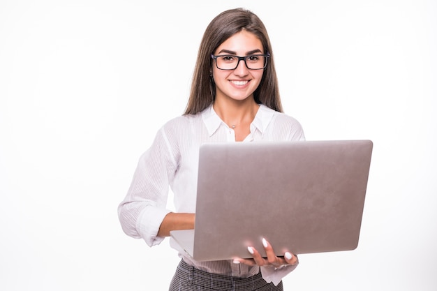 Gorgeous young student girl in white shirt use laptop isolated on white