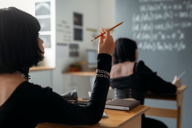 Free photo goth students at school in the classroom