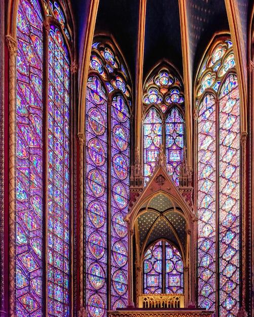 The gothic-style royal chapel of Sainte-Chapelle with jeweled windows in Paris, France