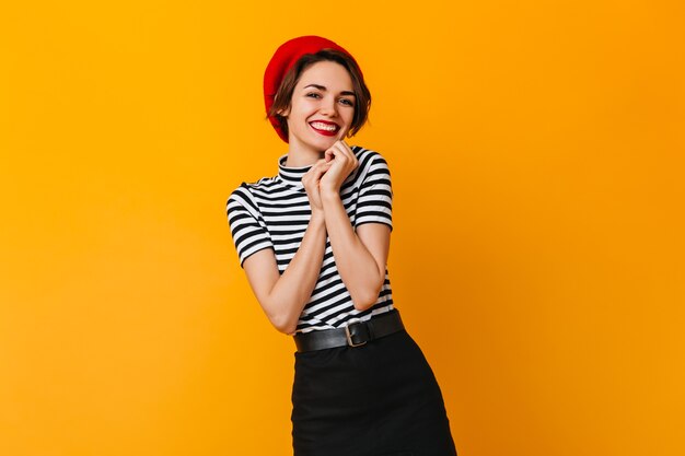 Graceful female model posing in french attire