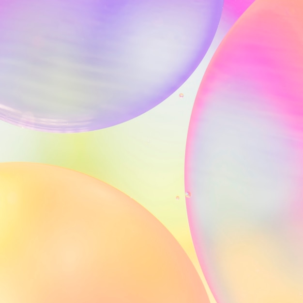 Gradient abstract bubbles on colorful vivid blurred background