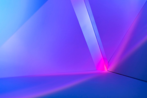 ピンクと紫の光の効果を持つグラデーションの背景