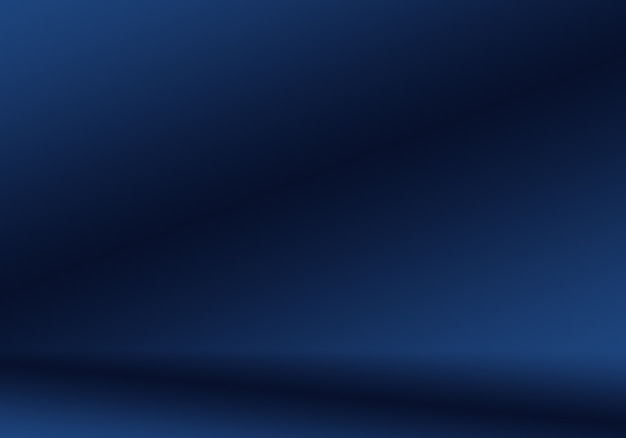 グラデーションブルーの抽象的な背景。ブラックビネットスタジオで滑らかなダークブルー。