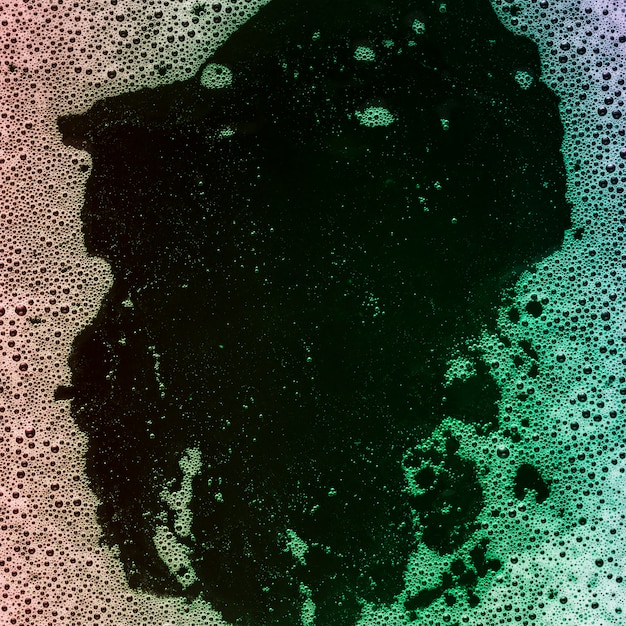 Foto gratuita liquido colorato sfumato con bolle