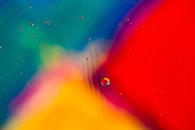 Gradient colour abstraction accompanied by transparent fluid bubbles