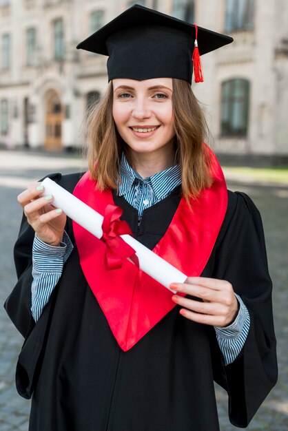 Graduation concept with portrait of happy girl