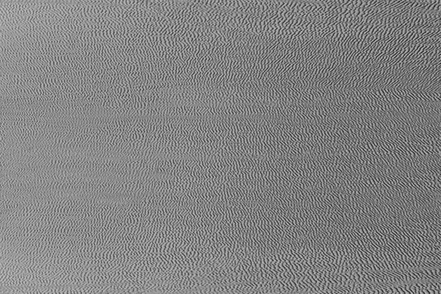 Grain textured gray fabric backdrop