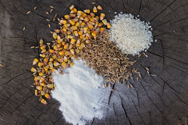 Grains food mix on wooden background