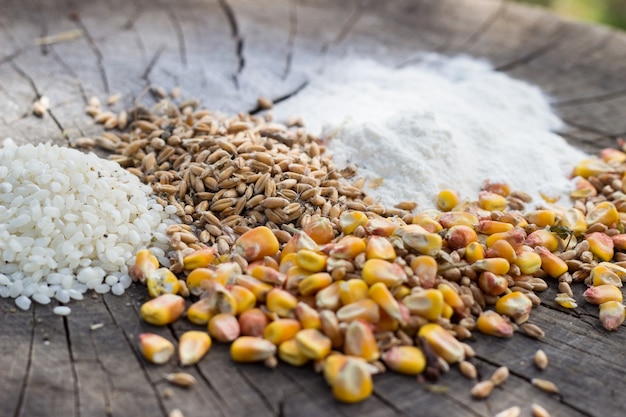 Grains food mix on wooden background