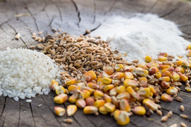 Grains food mix on wooden background