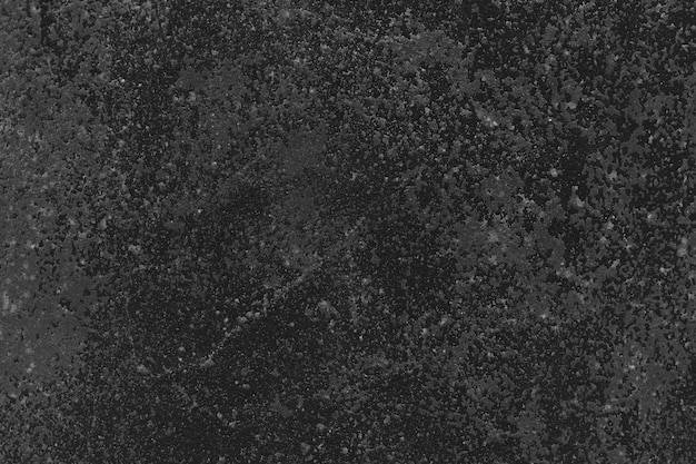Grainy black spotted background