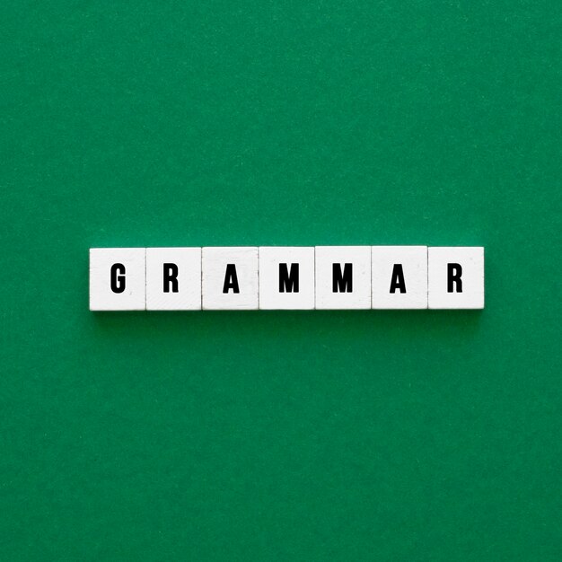 Grammar word on green surface