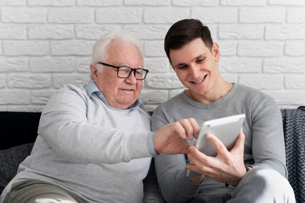 Grand parent learning to use digital divice