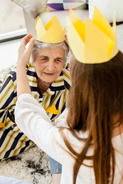 Free photo granddaughter celebrating grandmothers anniversary