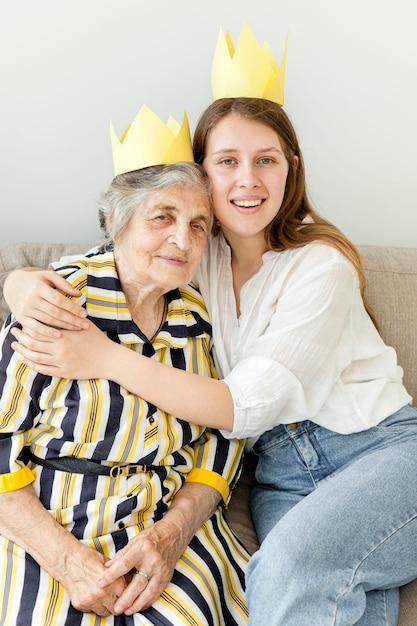 Granddaughter hugging her grandmother