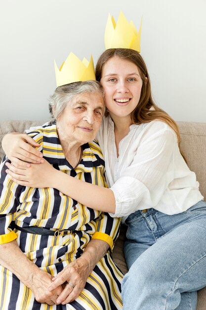 Granddaughter hugging her grandmother